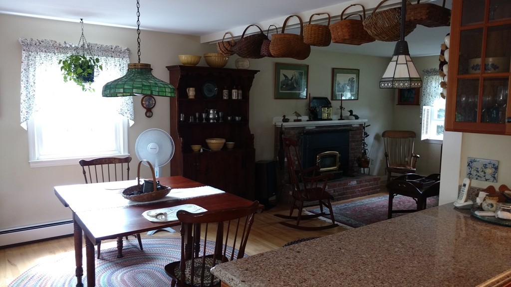 841 Dennison Drive Southbridge, MA 01550 - Photo 13 of 28 a view of a dining room with furniture and chandelier
