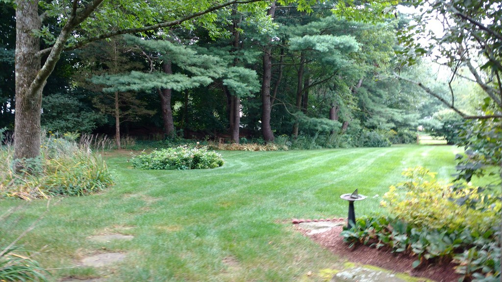 841 Dennison Drive Southbridge, MA 01550 - Photo 25 of 28 a backyard of a house with a yard and outdoor seating