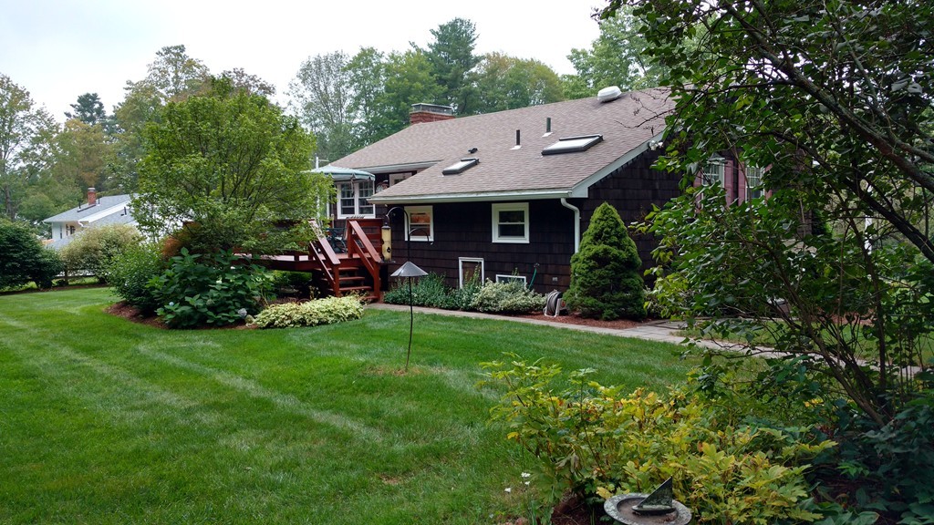 841 Dennison Drive Southbridge, MA 01550 - Photo 26 of 28 a view of house with garden and patio