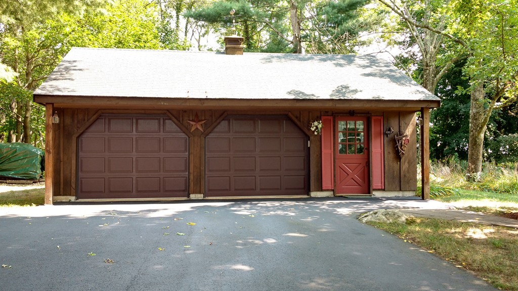 841 Dennison Drive Southbridge, MA 01550 - Photo 27 of 28 a view of house with yard and garage