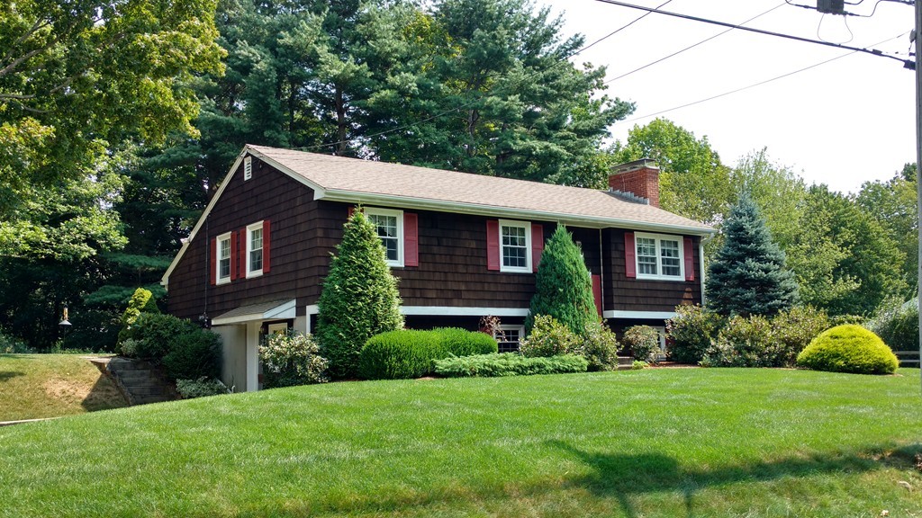 841 Dennison Drive Southbridge, MA 01550 - Photo 6 of 28 a view of a house with garden and yard