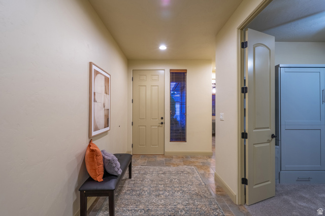 2212 Chippenham Court St. George, UT 84770 - Photo 19 of 75 Foyer entrance with stone tile floors and recessed lighting