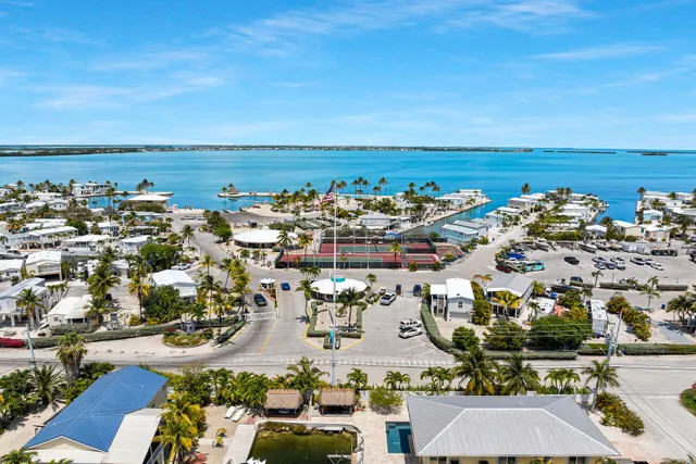 a view of a swimming pool with a table and chairs