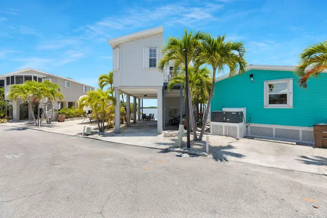 a view of a balcony with chairs
