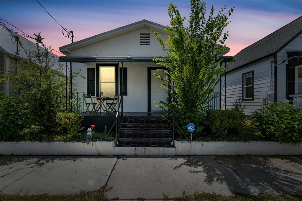 2336 West Walnut Street Tampa, FL 33607 - Photo 1 of 1 a front view of a house with garden