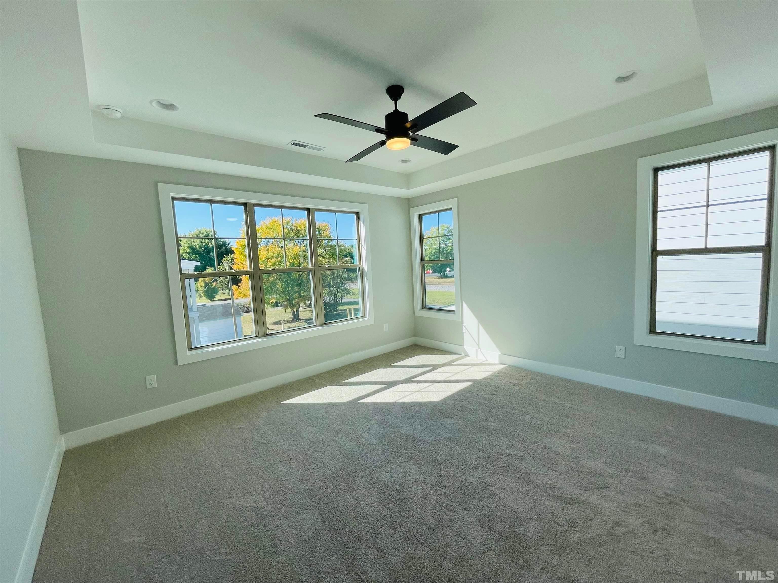 200 East Moore Street Apex, NC 27502 - Photo 12 of 32 a view of an empty room with a window