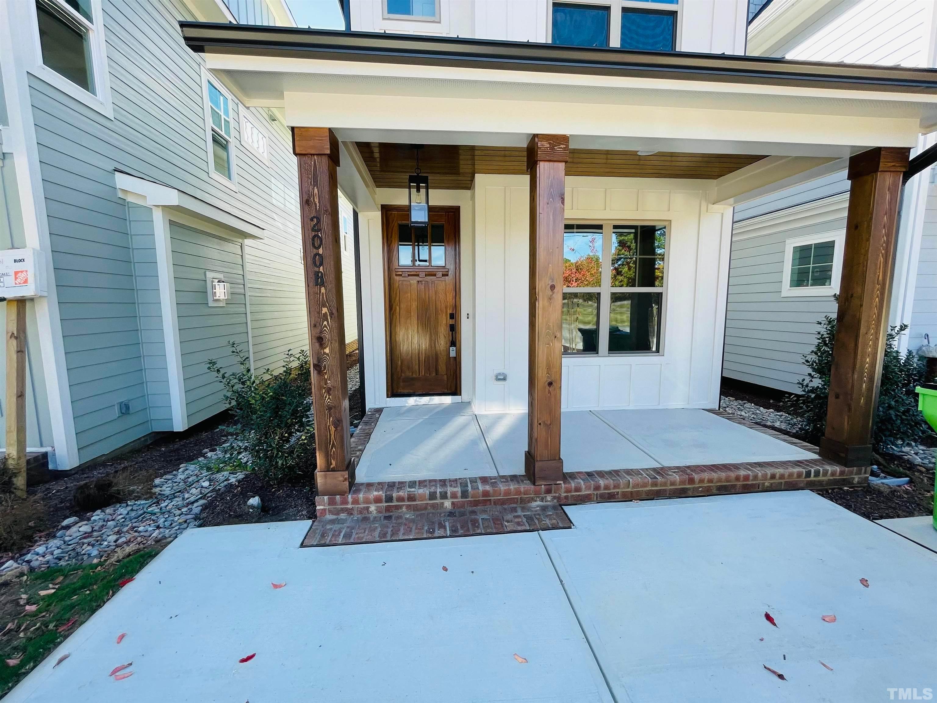 200 East Moore Street Apex, NC 27502 - Photo 2 of 32 a front view of a house