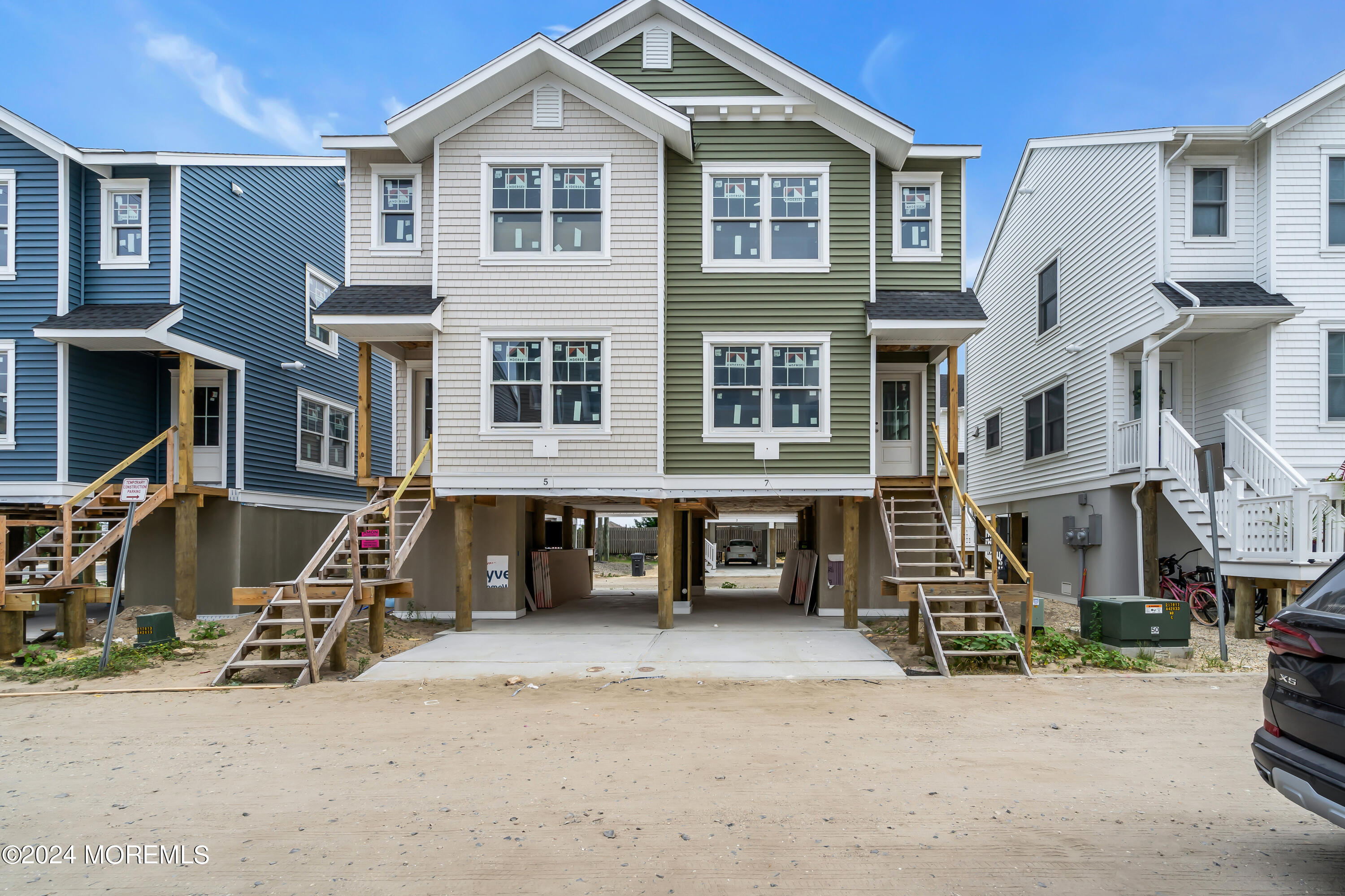 7 Shell Road, Unit 133 Mantoloking, NJ 08738 - Photo 1 of 44 a view of a house with many windows