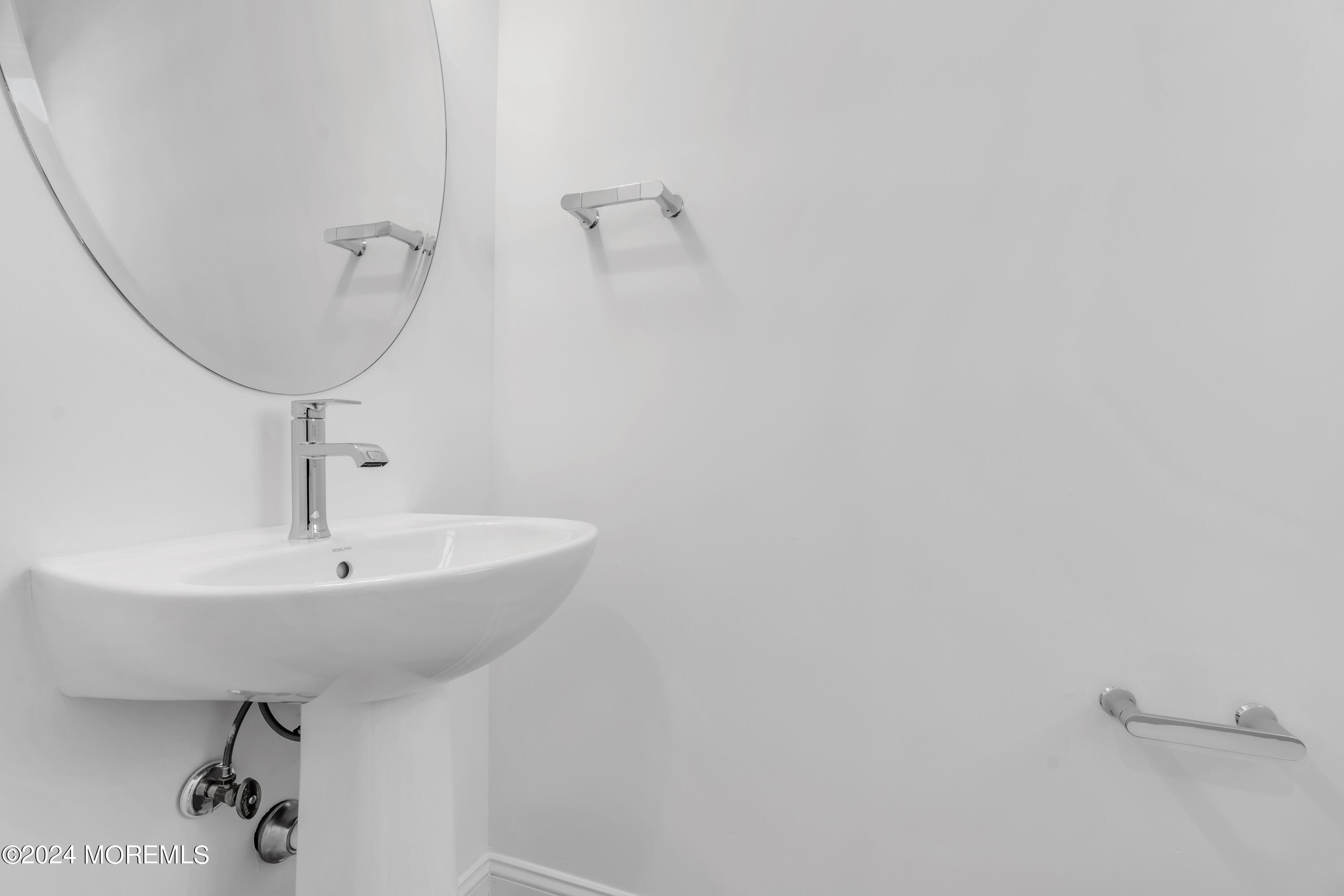 7 Shell Road, Unit 133 Mantoloking, NJ 08738 - Photo 18 of 44 a bathroom with a sink