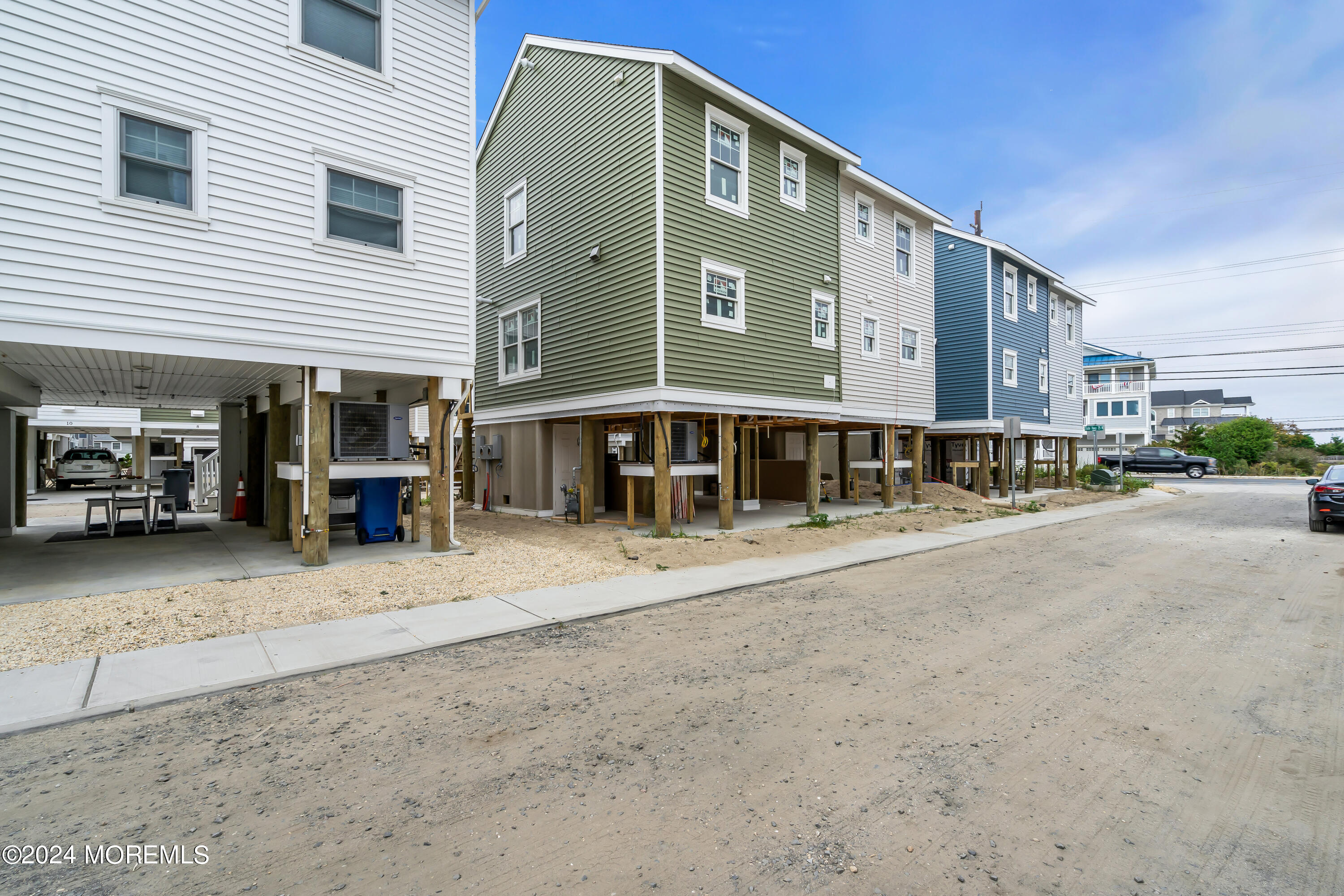 7 Shell Road, Unit 133 Mantoloking, NJ 08738 - Photo 42 of 44 a front view of a building with street