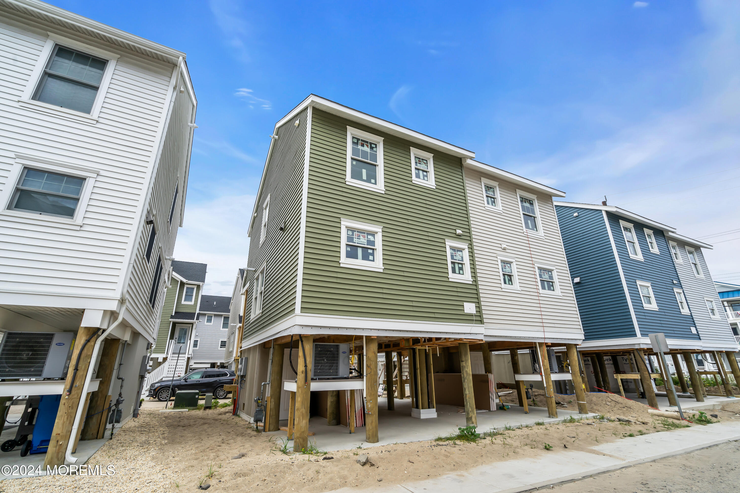 7 Shell Road, Unit 133 Mantoloking, NJ 08738 - Photo 44 of 44 a front view of a house with parking