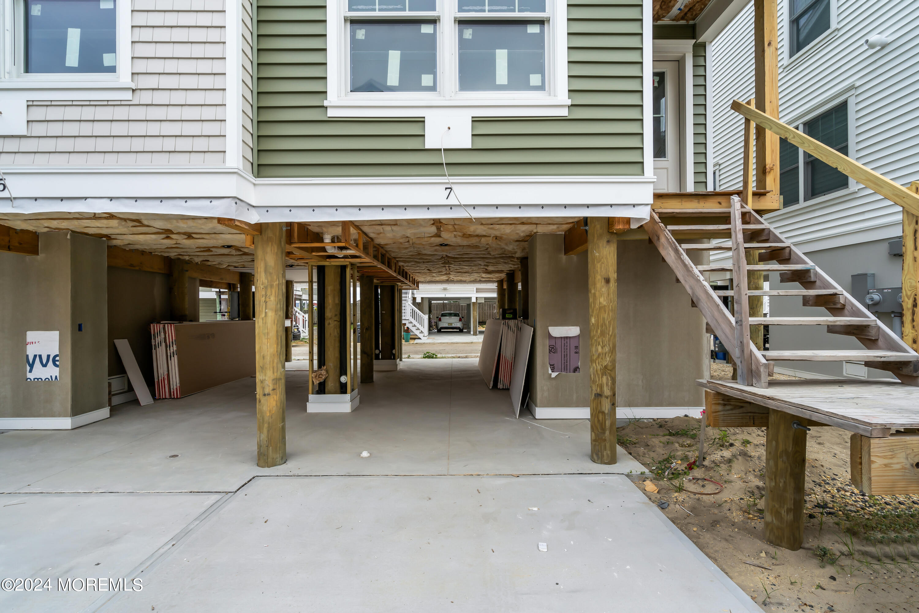 7 Shell Road, Unit 133 Mantoloking, NJ 08738 - Photo 6 of 44 a view of a car garage of the house