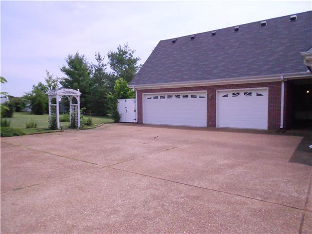 7296 Old Franklin Road Fairview, TN 37062 - Photo 16 of 18 3 Car attached garage. Old man winter can't touch you here.