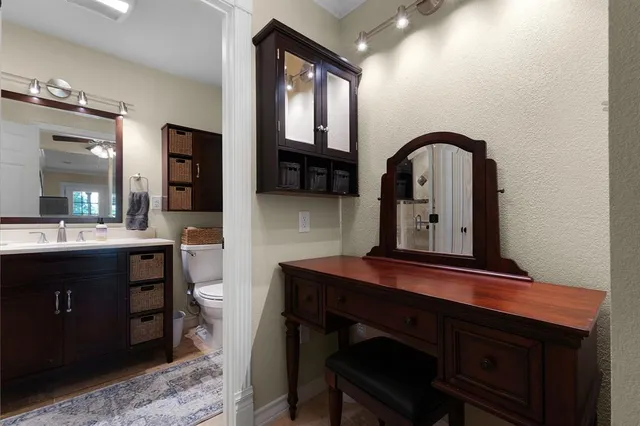 a bathroom with a sink double vanity and a mirror