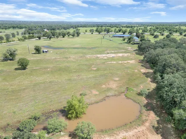 a view of a lake from a yard