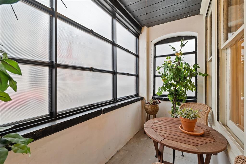 368 44th Street Pittsburgh, PA 15201 - Photo 12 of 39 a room with furniture and a potted plant