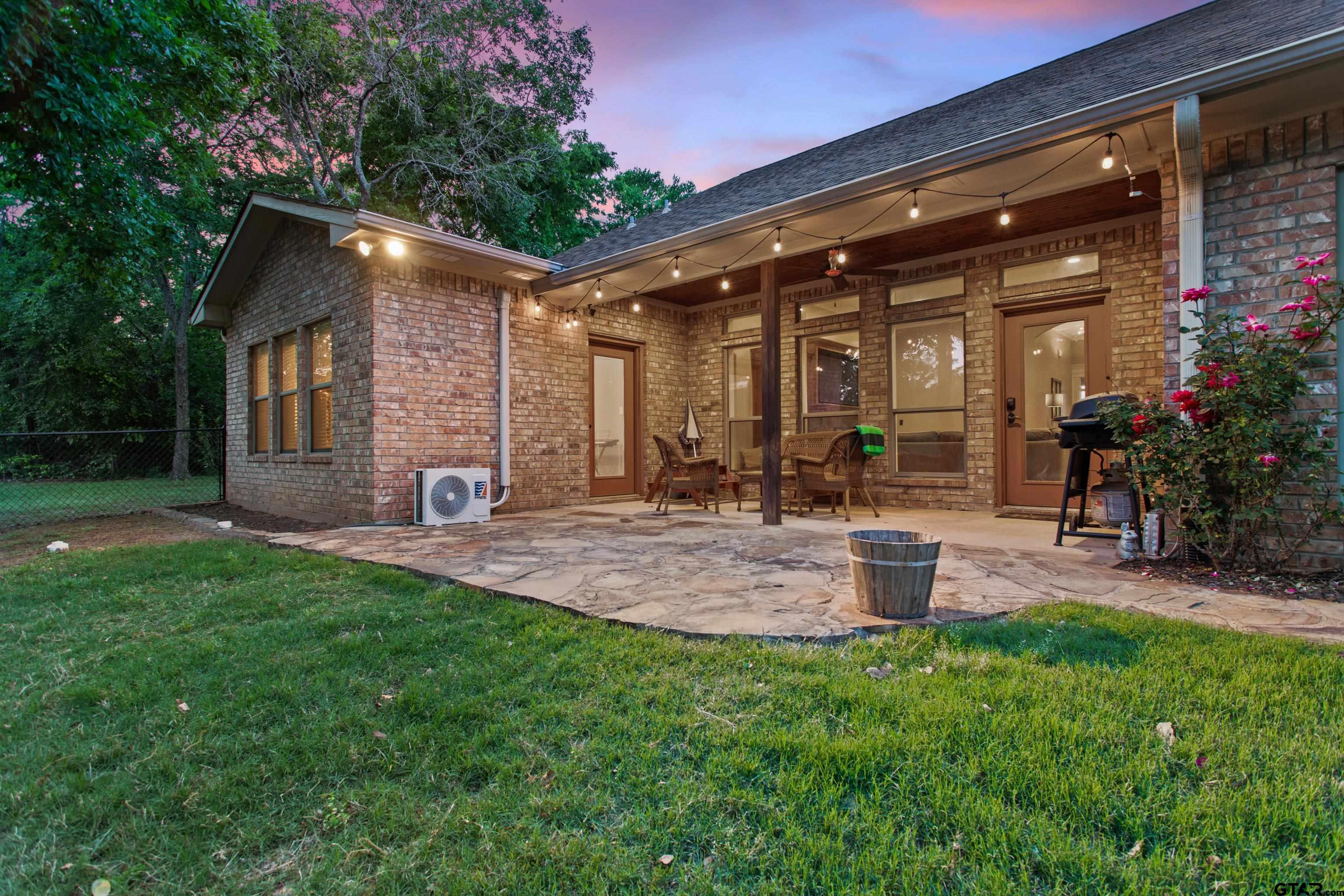 16551 Fox Run Lane Lindale, TX 75771 - Photo 27 of 41 a front view of a house with a yard