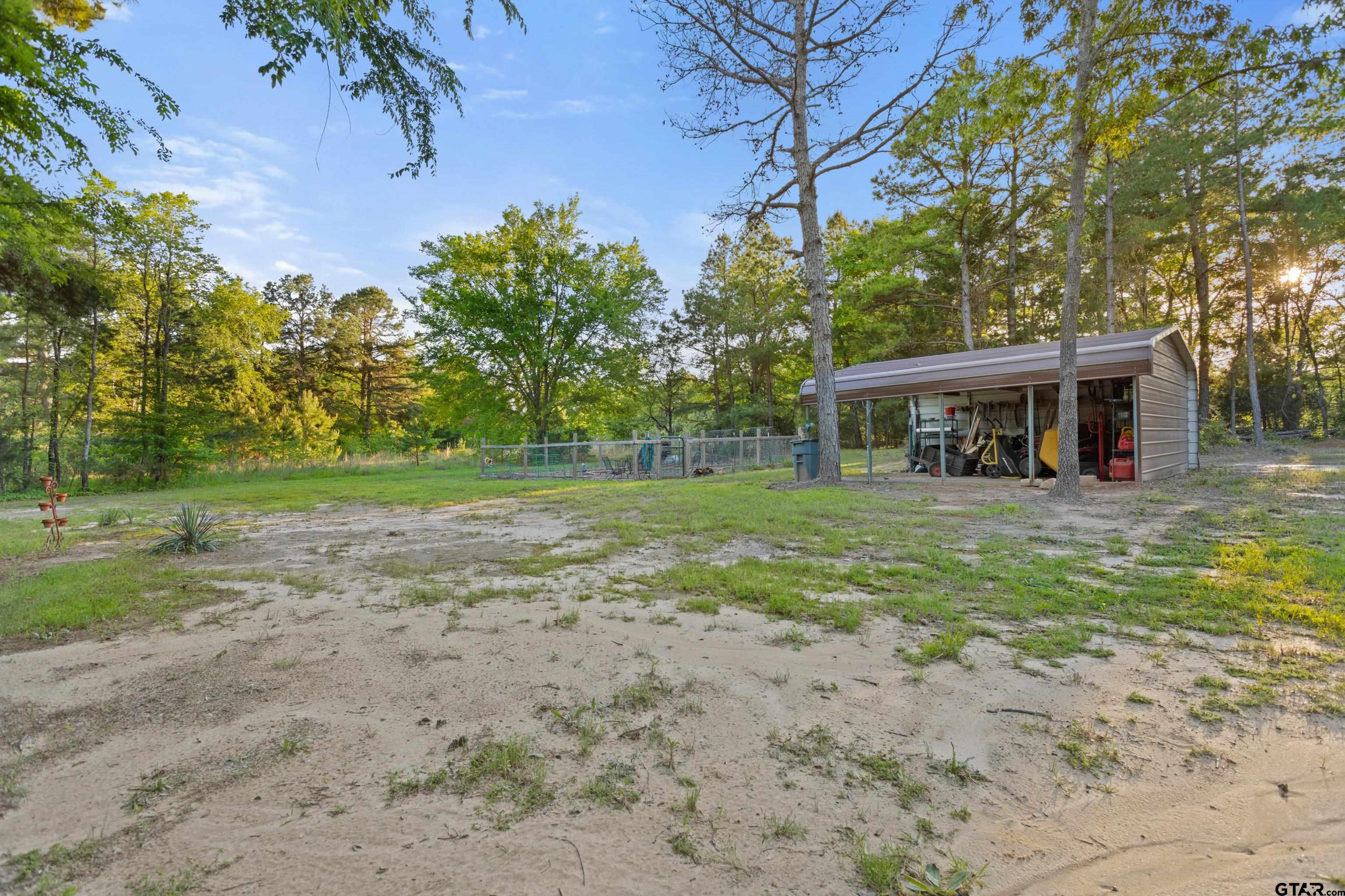 16551 Fox Run Lane Lindale, TX 75771 - Photo 32 of 41 a view of a house with a yard