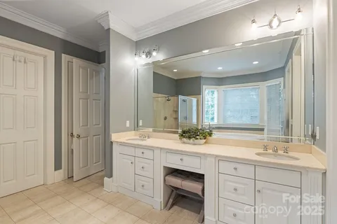a view of entryway with furniture and wooden floor