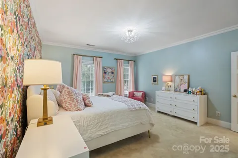 a front view of a house with garden and porch