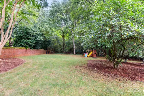a front view of house with outdoor seating