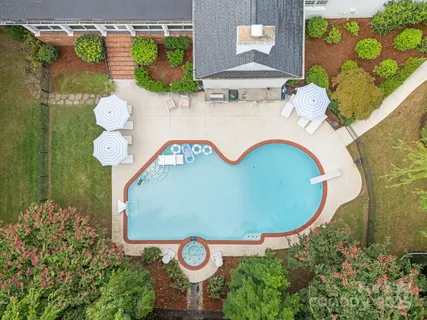 a view of entryway with a front door and wooden floor