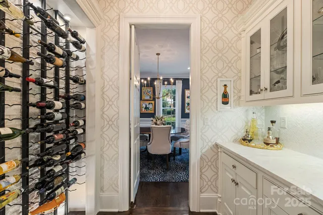 a kitchen with stainless steel appliances granite countertop a sink and cabinets