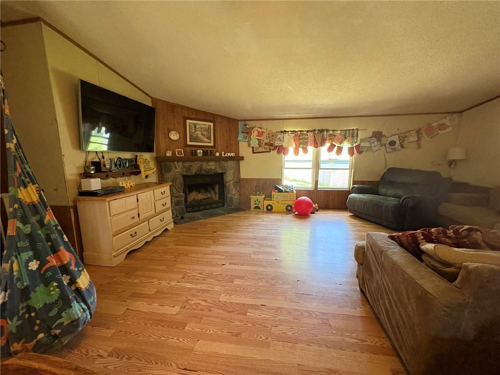 362 Hunters Lane Export, PA 15632 - Photo 2 of 17 a living room with furniture and a flat screen tv