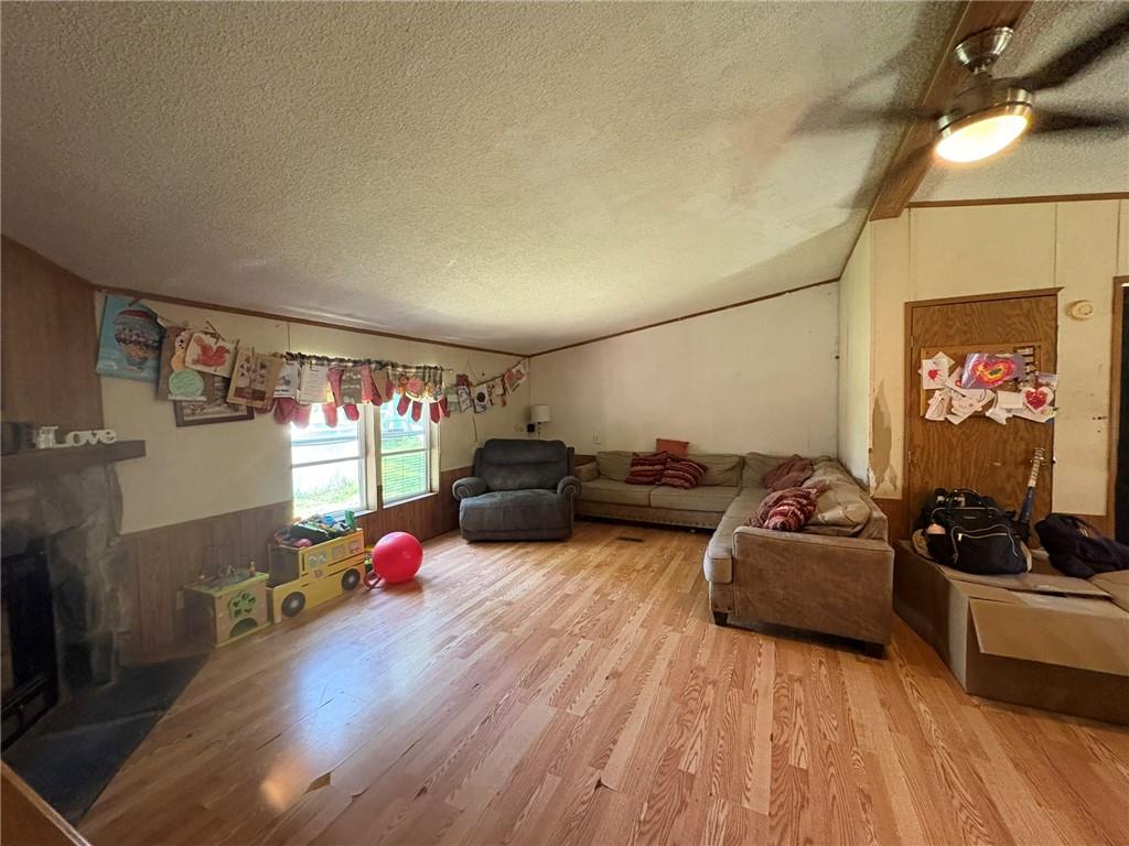 362 Hunters Lane Export, PA 15632 - Photo 4 of 17 a living room with furniture a flat screen tv and a couch