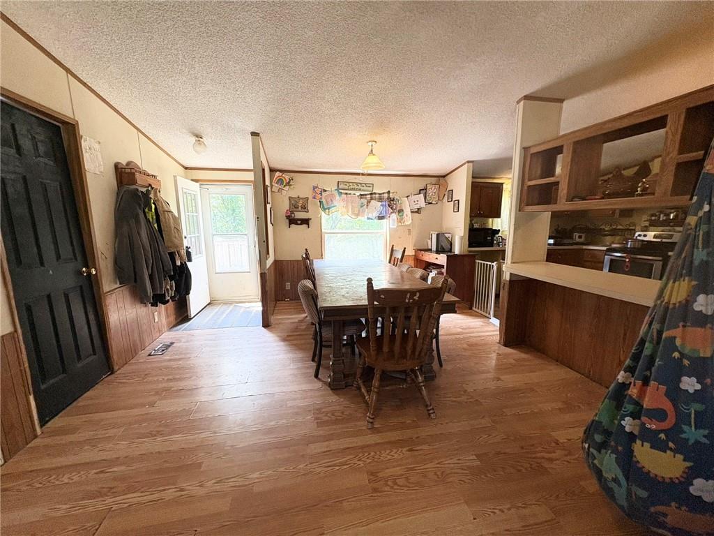 362 Hunters Lane Export, PA 15632 - Photo 6 of 17 a view of a dining room with furniture window and wooden floor