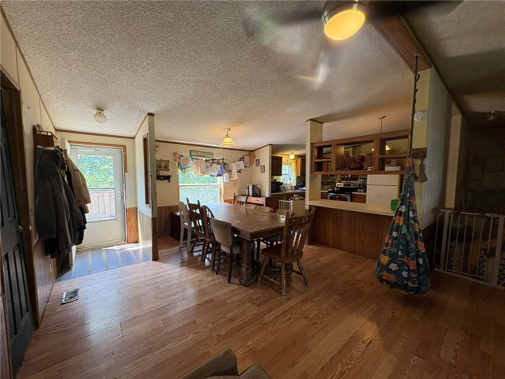 362 Hunters Lane Export, PA 15632 - Photo 7 of 17 a view of a dining room with furniture and a chandelier