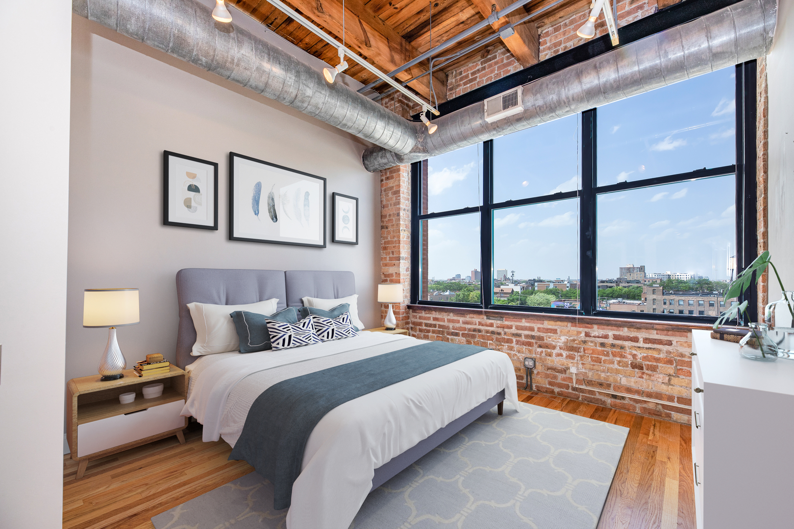 312 North May Street, Unit 5F Chicago, IL 60607 - Photo 9 of 16 a bed sitting in a bedroom next to a large window
