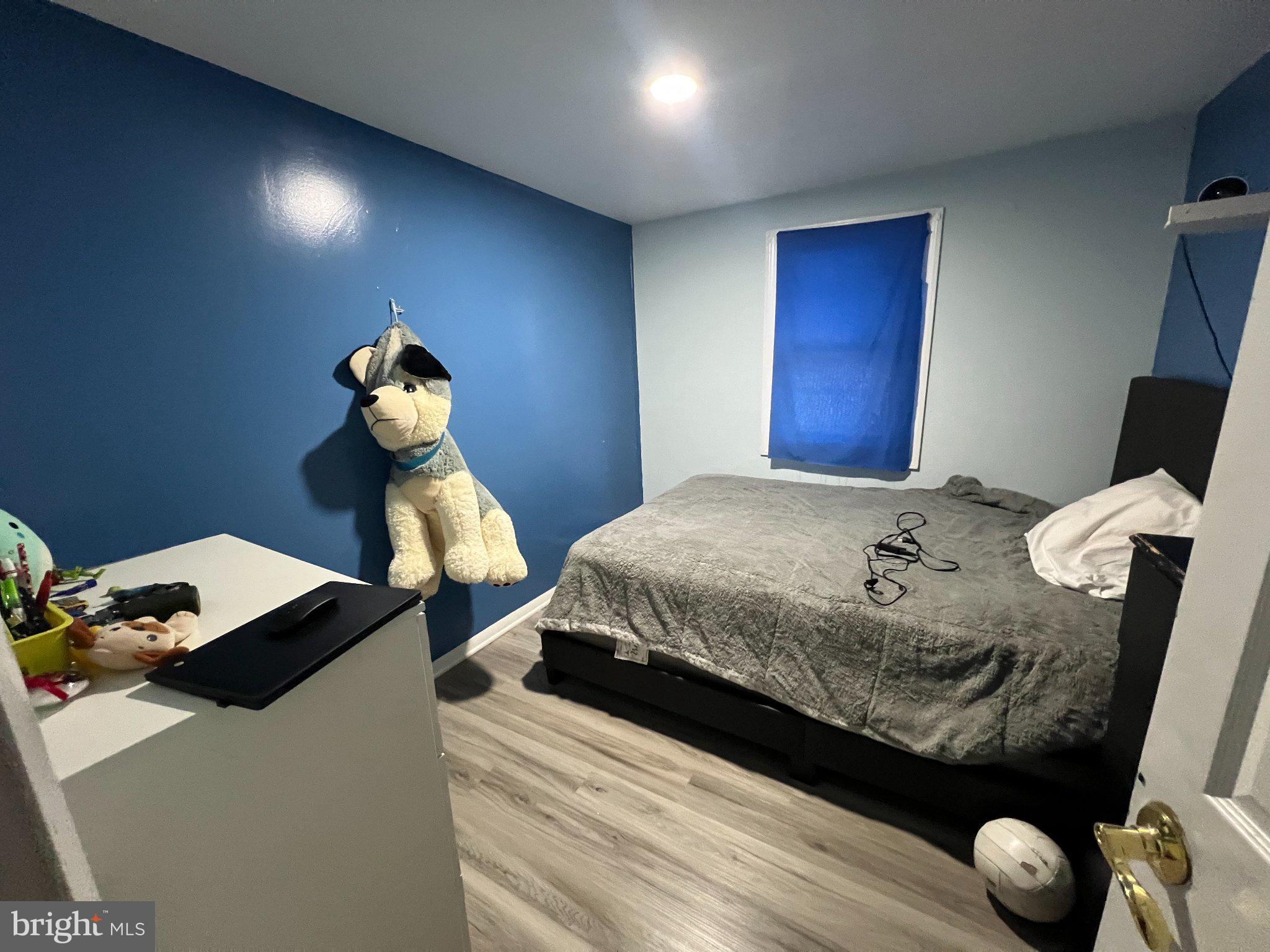 910 Magnolia Avenue Croydon, PA 19021 - Photo 12 of 23 a bedroom with bed and a window