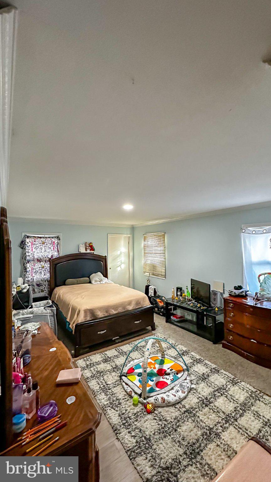 910 Magnolia Avenue Croydon, PA 19021 - Photo 14 of 23 a bedroom with bed and furniture