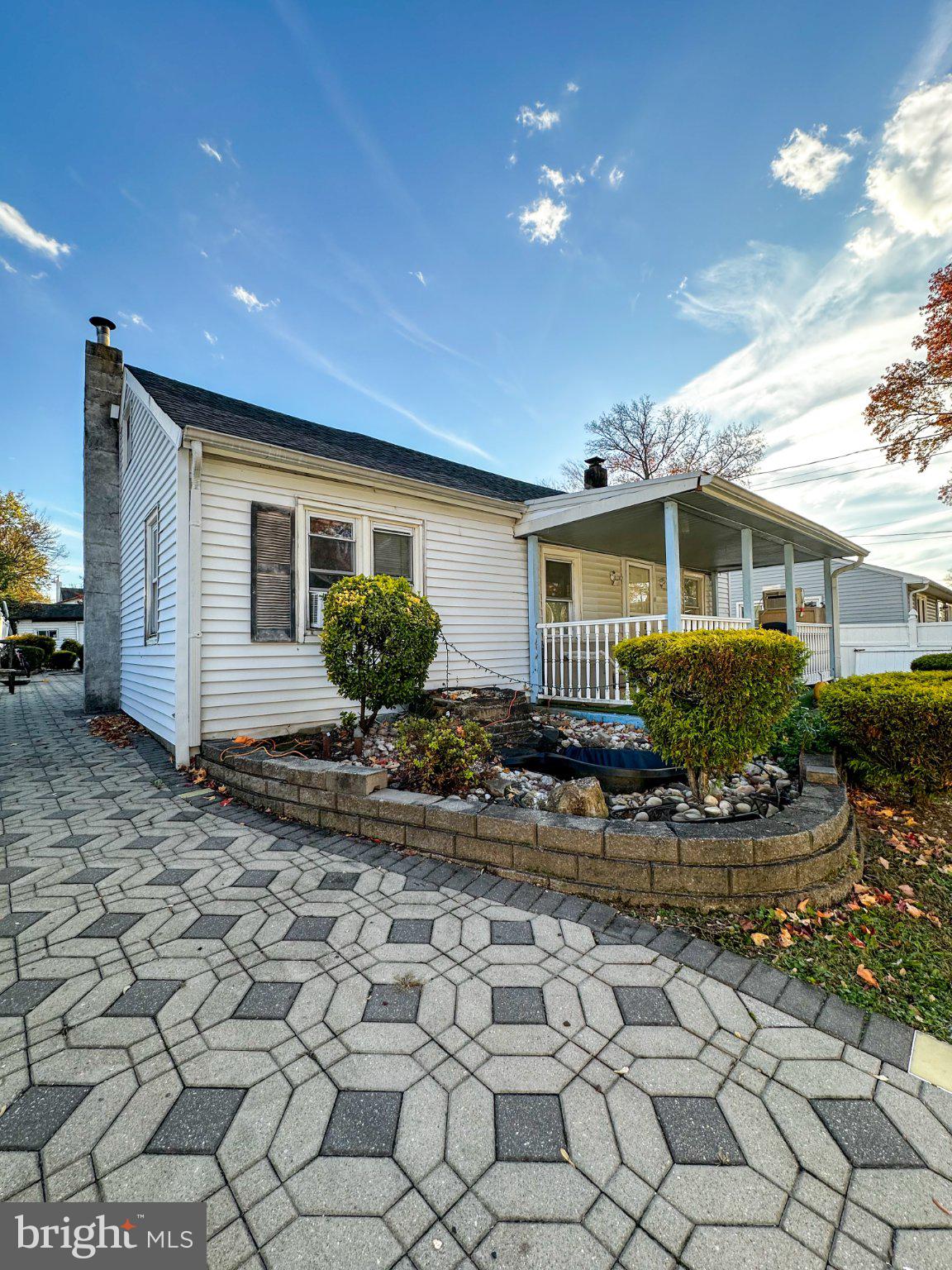 910 Magnolia Avenue Croydon, PA 19021 - Photo 2 of 23 a front view of house with yard and plants