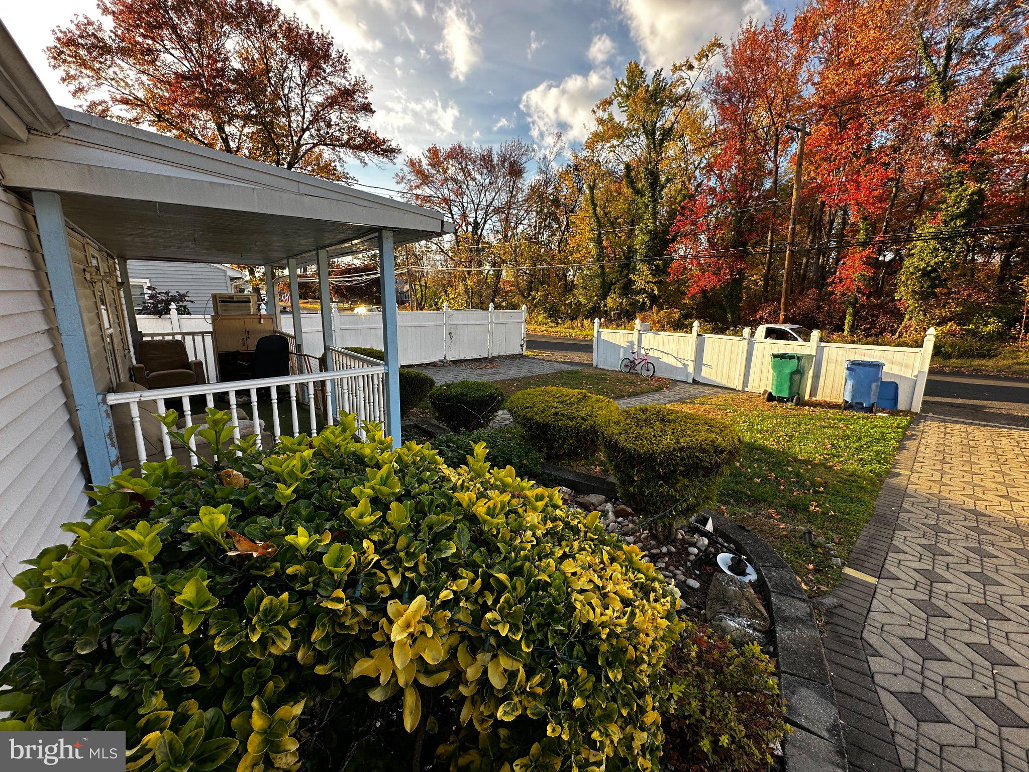910 Magnolia Avenue Croydon, PA 19021 - Photo 3 of 23 a view of a house with large trees