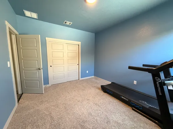 a view of a livingroom with a staircase