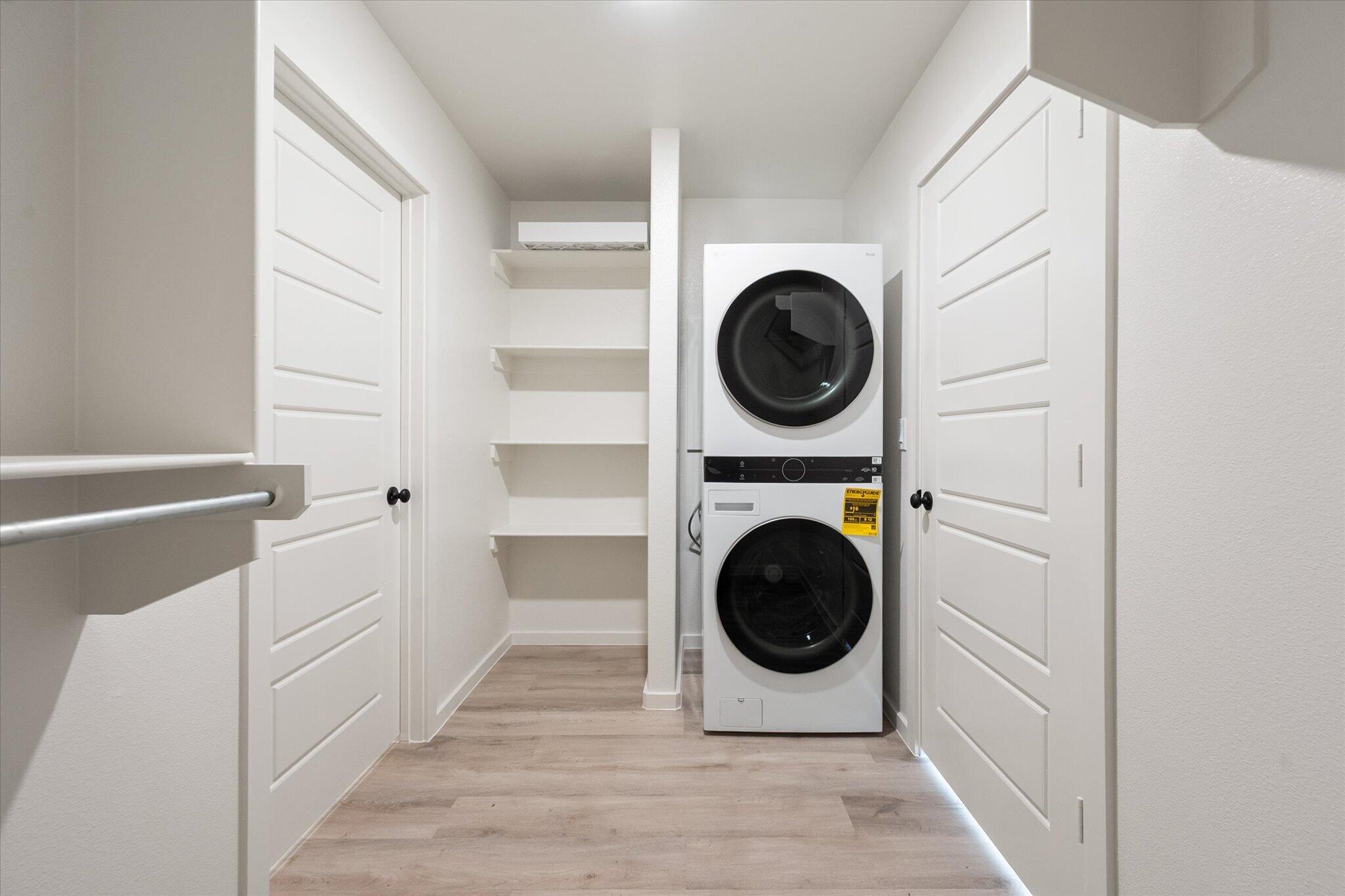 5506 Smith Street Lubbock, TX 79416 - Photo 14 of 16 a utility room with sink dryer and washer