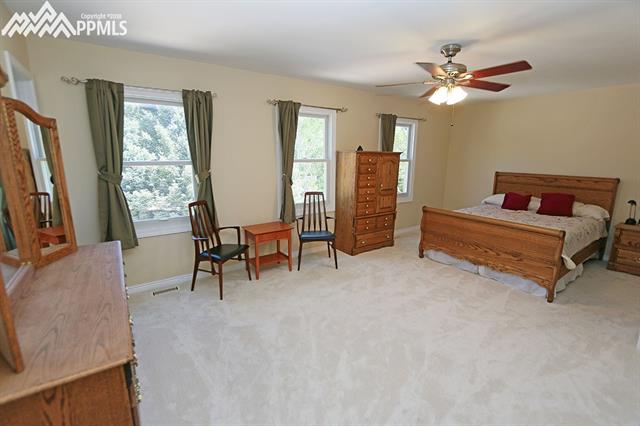 3123 Springdowns Place Colorado Springs, CO 80906 - Photo 15 of 36 Large Master Bedroom. New carpet with Tempur-Pedic padding in 2016