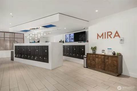 a spacious bathroom with a sink a mirror and a bathtub