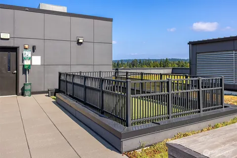 a view of balcony with wooden floor