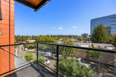 a view of a balcony next to a lake view