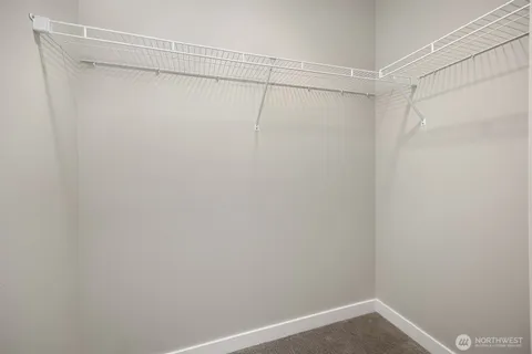 a view of an empty walk in closet