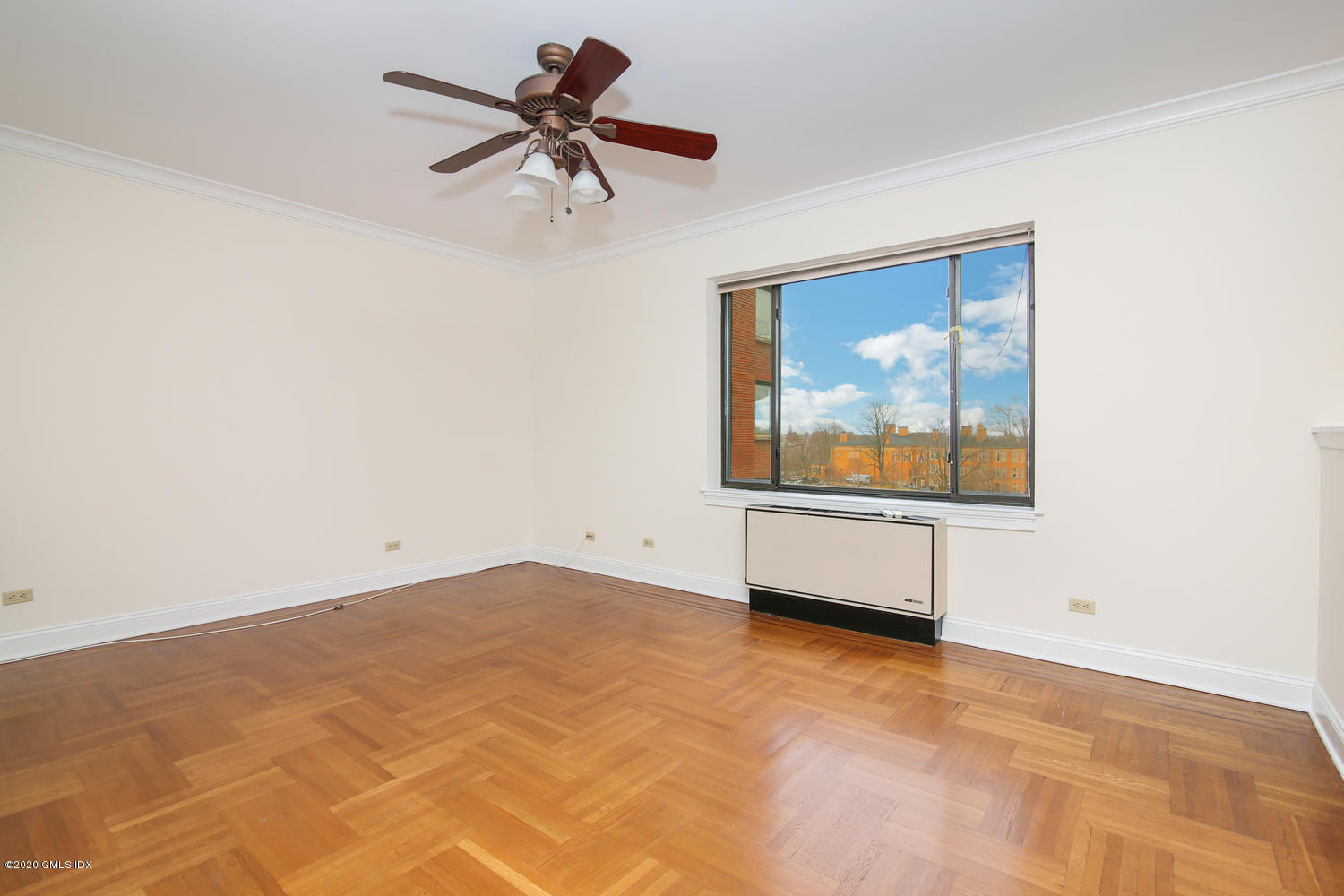 40 West Elm Street, Unit 3M Greenwich, CT 06830 - Photo 6 of 19 a view of empty room with ceiling fan