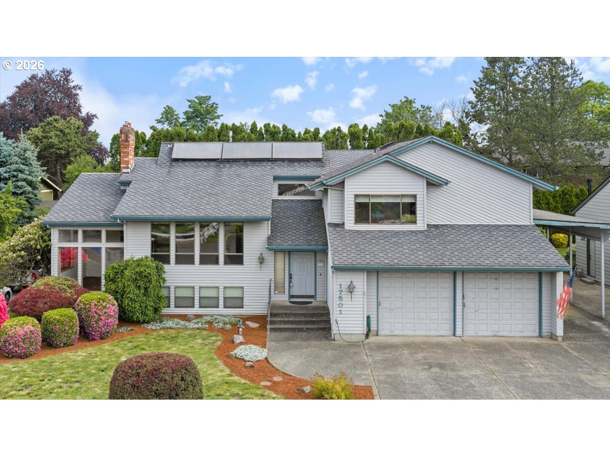 17501 Northeast Clackamas Street Portland, OR 97230 - Photo 1 of 38 a view of a house with a yard and potted plants