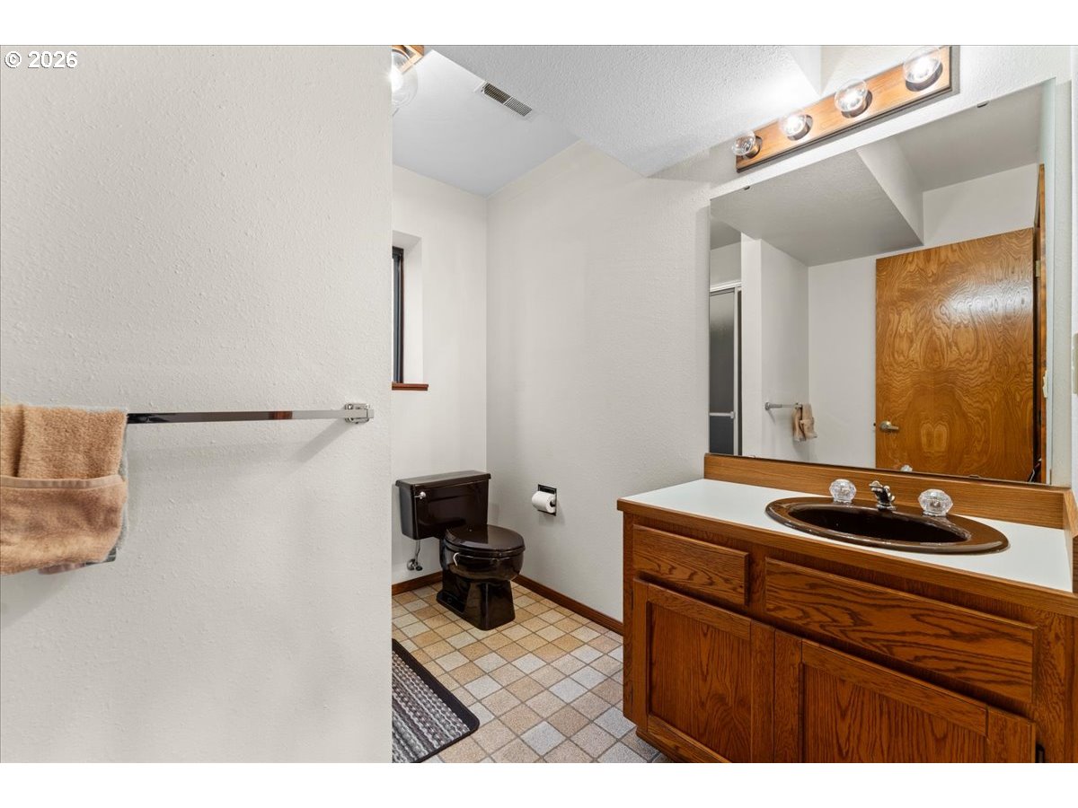 17501 Northeast Clackamas Street Portland, OR 97230 - Photo 32 of 38 a bathroom with a sink and a mirror