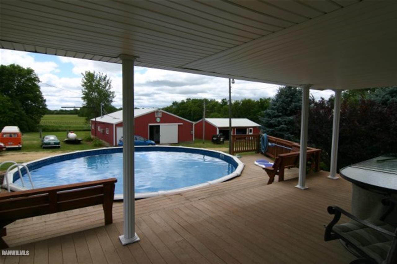 6031 West Kermit Road Freeport, IL 61032 - Photo 3 of 12 a view of a swimming pool with a patio