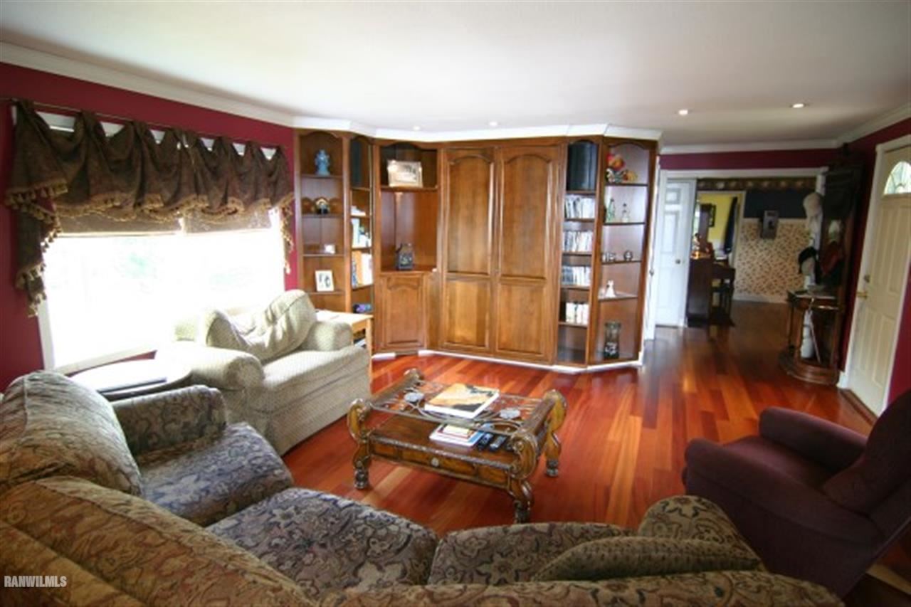 6031 West Kermit Road Freeport, IL 61032 - Photo 6 of 12 a living room with furniture and a wooden floor