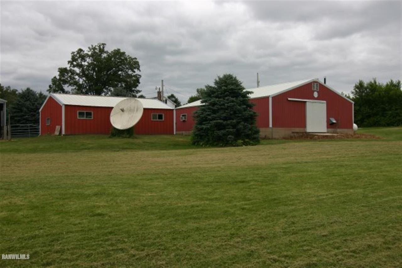 6031 West Kermit Road Freeport, IL 61032 - Photo 10 of 12 a view of a house with a yard
