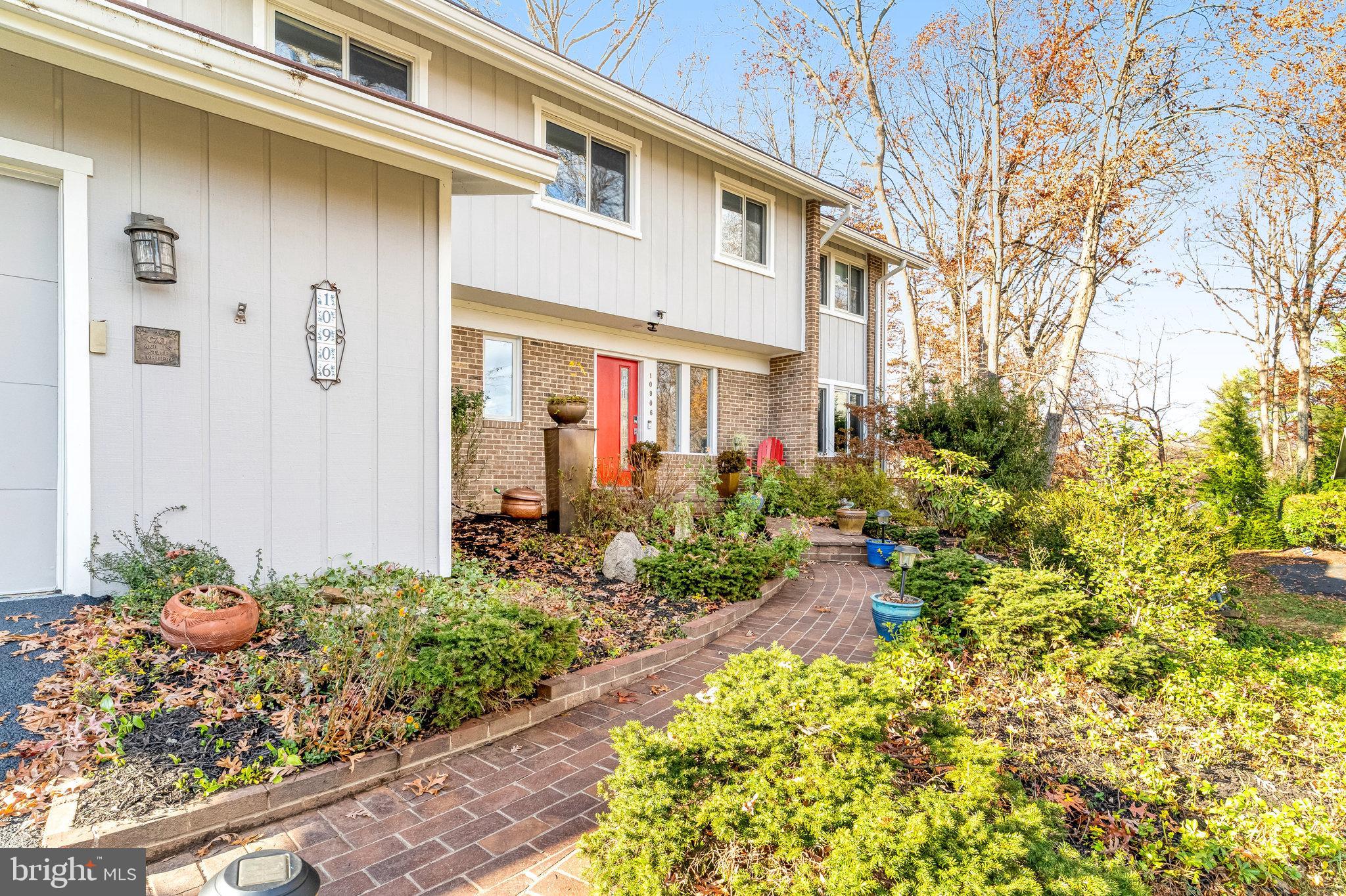 Charming brick front walk way.